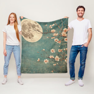 Manta Polar Serenidad con flores de cerezo iluminadas por luna