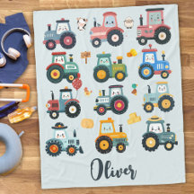 Tractores de bebé pequeños en una granja