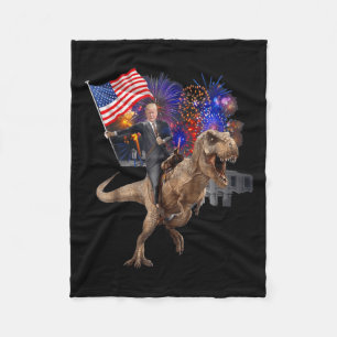 Manta Polar Trump montando un dinosaurio en T-rex apoya a Trum