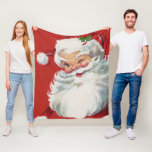 Manta Polar Vintage Christmas, Jolly Santa Claus Winning<br><div class="desc">Ho,  ho,  ho,  ¡Feliz Navidad! Diseño de vacaciones de Navidades de ilustracion de época con un alegre y feliz Santa Claus guiñando el ojo como si tuviera un secreto. Él lleva puesto un gorra con hojas huecas.</div>