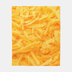 Manta Polar vista superior de queso cheddar rallado