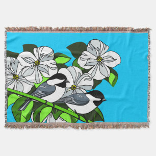Manta Pollo entre flores de madera de madera
