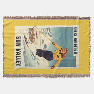 Manta poster sonriente y de esquí de la mujer