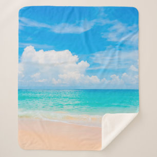 Manta Sherpa Beautiful tropical beach with blue sky and white c