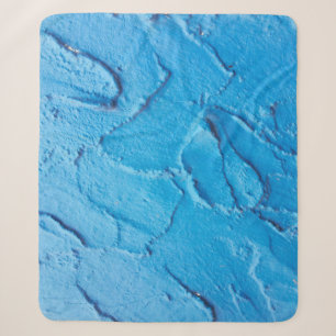 Manta Sherpa Cemento decorativo sobre una textura de pared.abst
