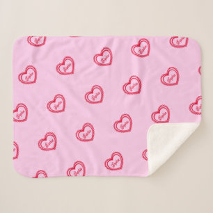 Manta Sherpa Corazones rojos personalizados sobre rosa Bonito