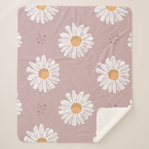 Manta Sherpa Daisy Rosa: Patrón de repetición floral.