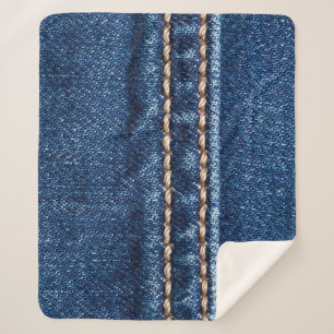 Manta Sherpa Denim con título: textura de jeans cerrados.