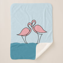 Dos flamencos rosados en agua pequeña