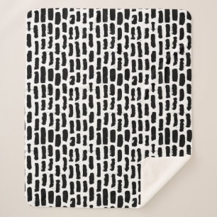 Manta Sherpa El cepillo negro frota ligeramente el modelo