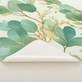 Manta Sherpa Eucalyptus deja un diseño verde y dorado