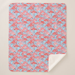 Manta Sherpa Flamencos rosados brillantes en azul