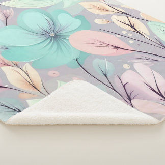 Manta Sherpa Flores y hojas pasteles sobre fondo morado
