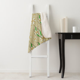 Manta Sherpa Fondo beige de color blanco floral monograma