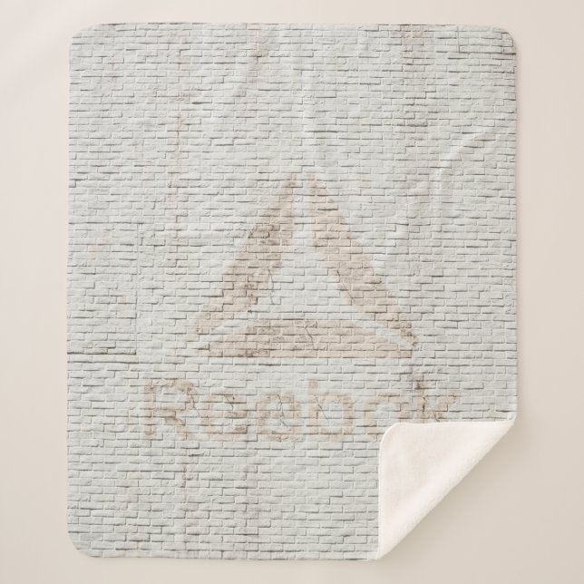 Manta Sherpa Foto de primer plano del logo de Reebok en la pare (Anverso)