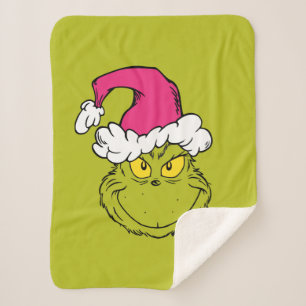 Manta Sherpa Grinch con sombrero rosa de Santa