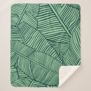 Manta Sherpa Hojas tropicales. Textura sin foco con hoja de plá