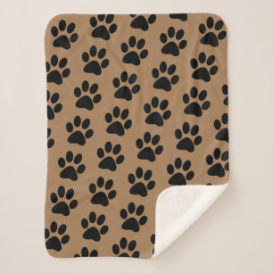 Manta Sherpa huellas de la pata negra en marrón