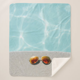 Manta Sherpa Lente naranja con marco dorado gafas de sol al est