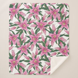 Manta Sherpa Lilios floreciendo en rosa pastel sobre blanco