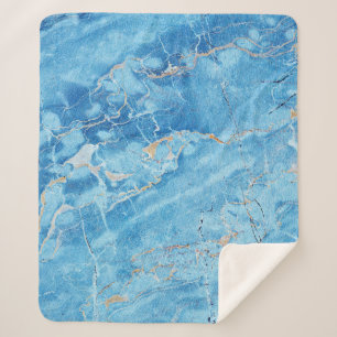 Manta Sherpa Marble Elegance: Superficie texturada natural.