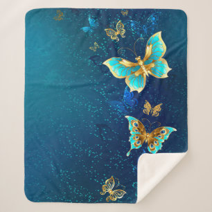 Manta Sherpa Mariposas doradas sobre fondo azul