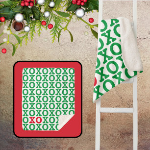 Manta Sherpa Navidades abrazan besos patrón rojo verde