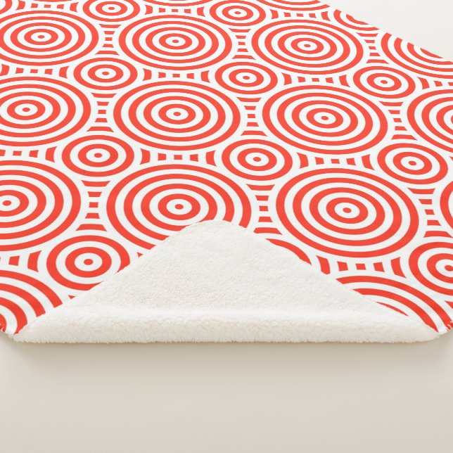 Manta Sherpa Patrón circular anidado de naranja y blanco (3/4)