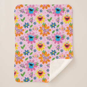 Manta Sherpa Patrón floral rosado de Plaza Sésamo