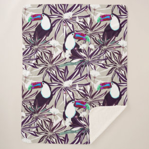 Manta Sherpa Patrón tropical con palmeras y aves.