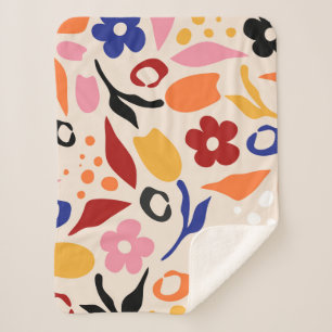 Manta Sherpa Pétalos en movimiento