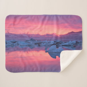 Manta Sherpa Puesta de sol sobre la laguna glaciar de Jokulsarl