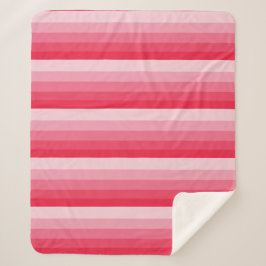 Manta Sherpa Rayas ómbre en tonos rojos a rosas