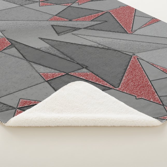 Manta Sherpa Recortes triangulares en bruto, sobre fondo rojo (3/4)