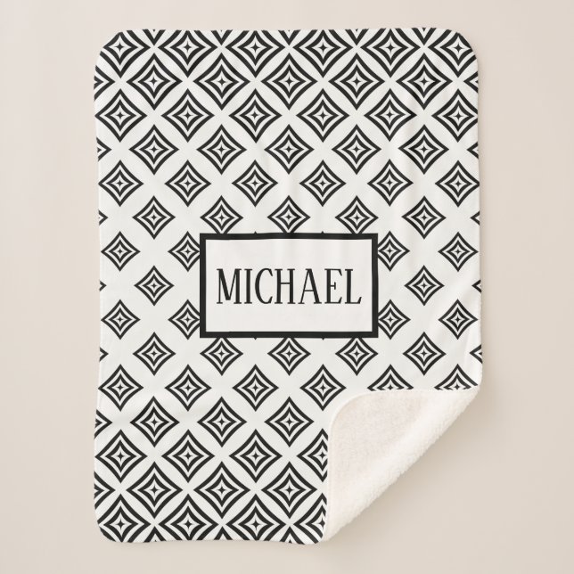 Manta Sherpa Rhomboide negro monogramado (Anverso)