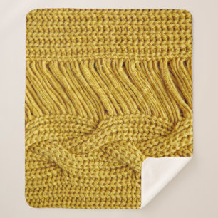 Manta Sherpa Suéter amarillo acogedor: fondo texturado