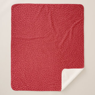 Manta Sherpa Tapón de cuero artificial rojo oscuro.