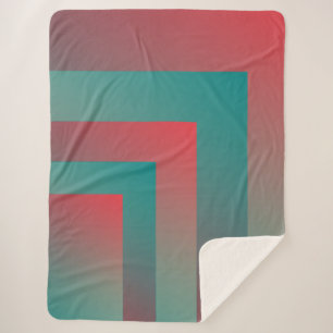 Manta Sherpa tonos verde azulados de coral