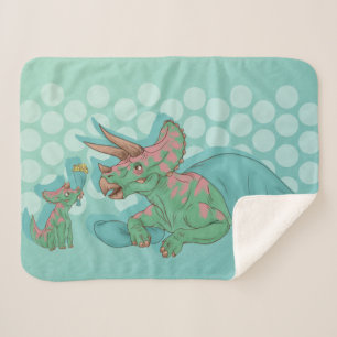 Manta Sherpa Triceratops dando flores