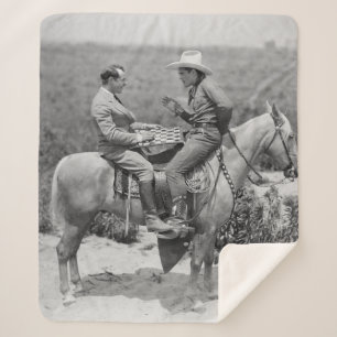 Manta Sherpa Vaquero y empresario jugando damas a caballo