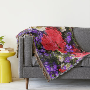Manta Tejida Flores anuales moradas, rojas y blancas