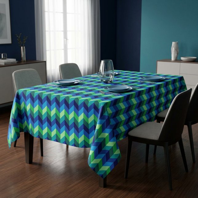 Mantel de mesa mediano con chevrones ombré verde a (Blue Green Ombre Chevrons Medium Tablecloth covering a table in a modern style dining room.)