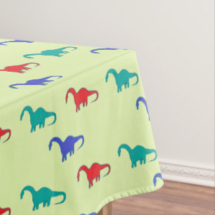 Mantel Dino colorido sobre verde