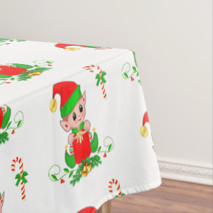 Mantel Duende de Navidad y bastón de caramelo sobre mante