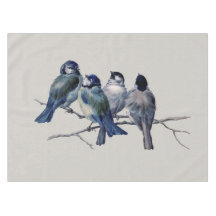 Elegantes aves azules en una rama