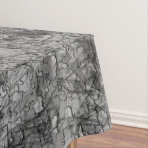 Mantel Escrates sobre un gris y negro ligeramente manchad