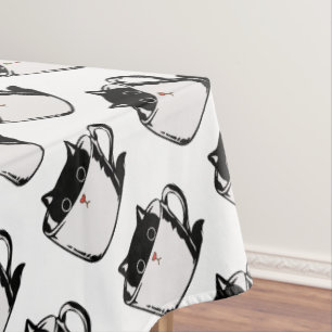 Mantel Gatito negro con nariz roja escondido en una taza