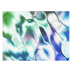 Mantel Luz tallada de color metalizado mate, verde a azul