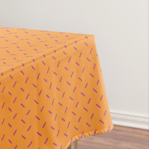 Mantel Naranja con manto de patrón de guiones púrpura