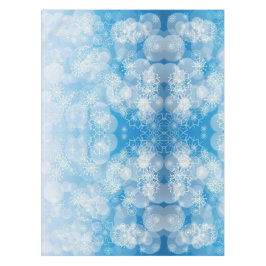 Mantel Navidades con copos de nieve en un fondo azul